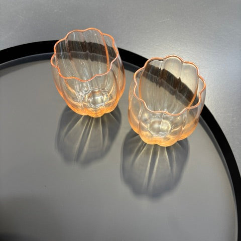 Roxy tray in black holding two orange scalloped glass bowls