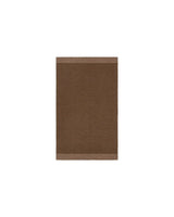 Carla entrance mat in cocoa brown with a tan woven border
