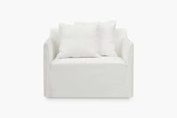 Joe loveseat in white loose cover with scatter cushions, angled view