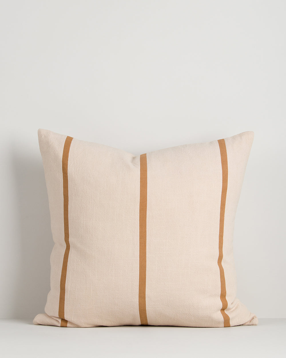 Otis Cushion in caramel, front view