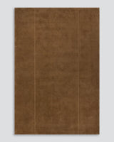 Bastion rug in hazelnut, full view on grey