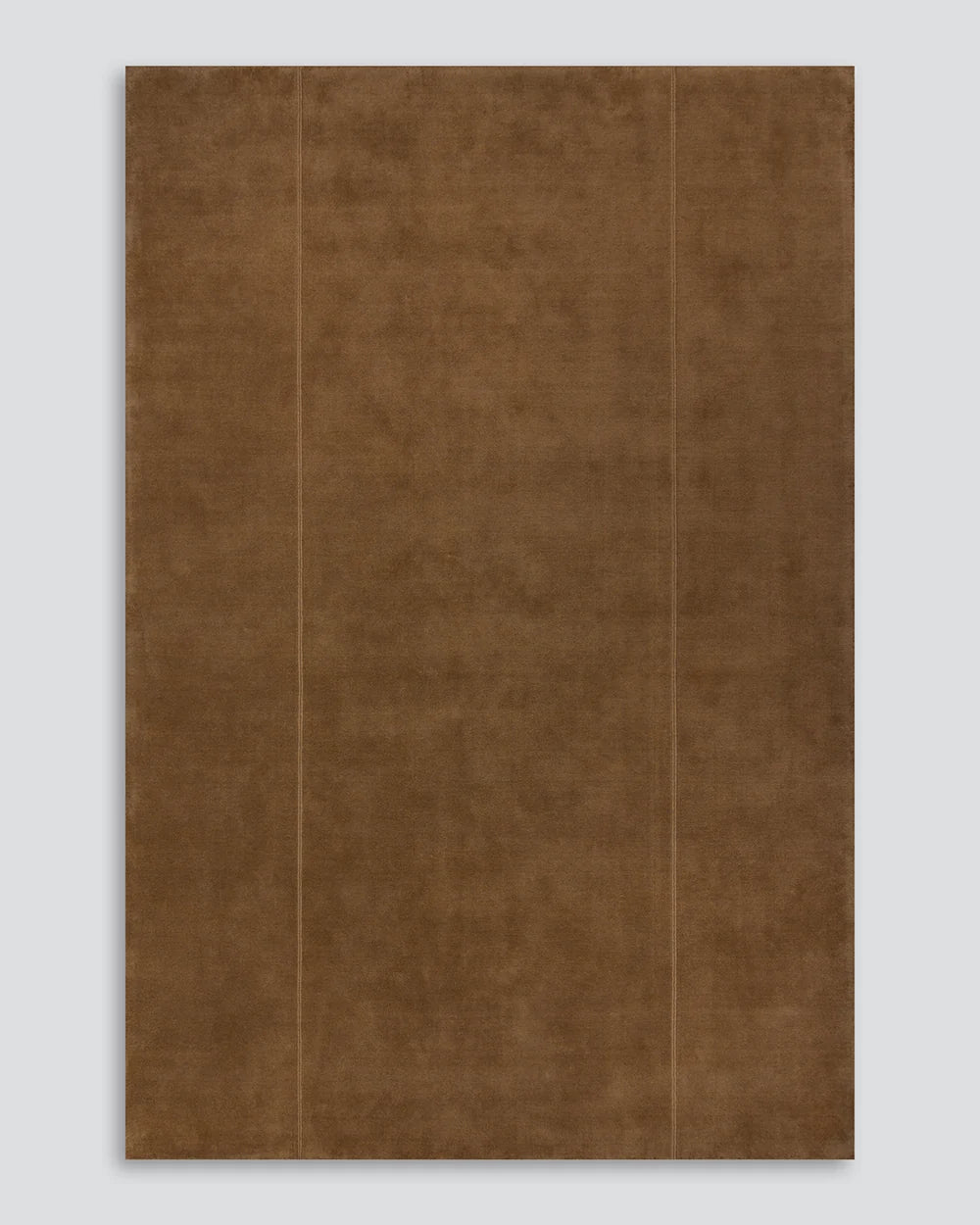 Bastion rug in hazelnut, full view on grey